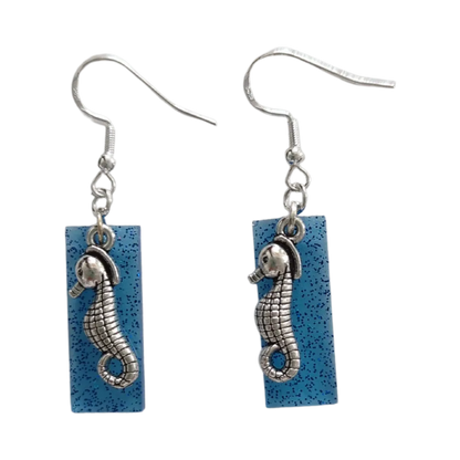 Earrings - Resin blue glitter rectangle with silver seahorse charm on hook