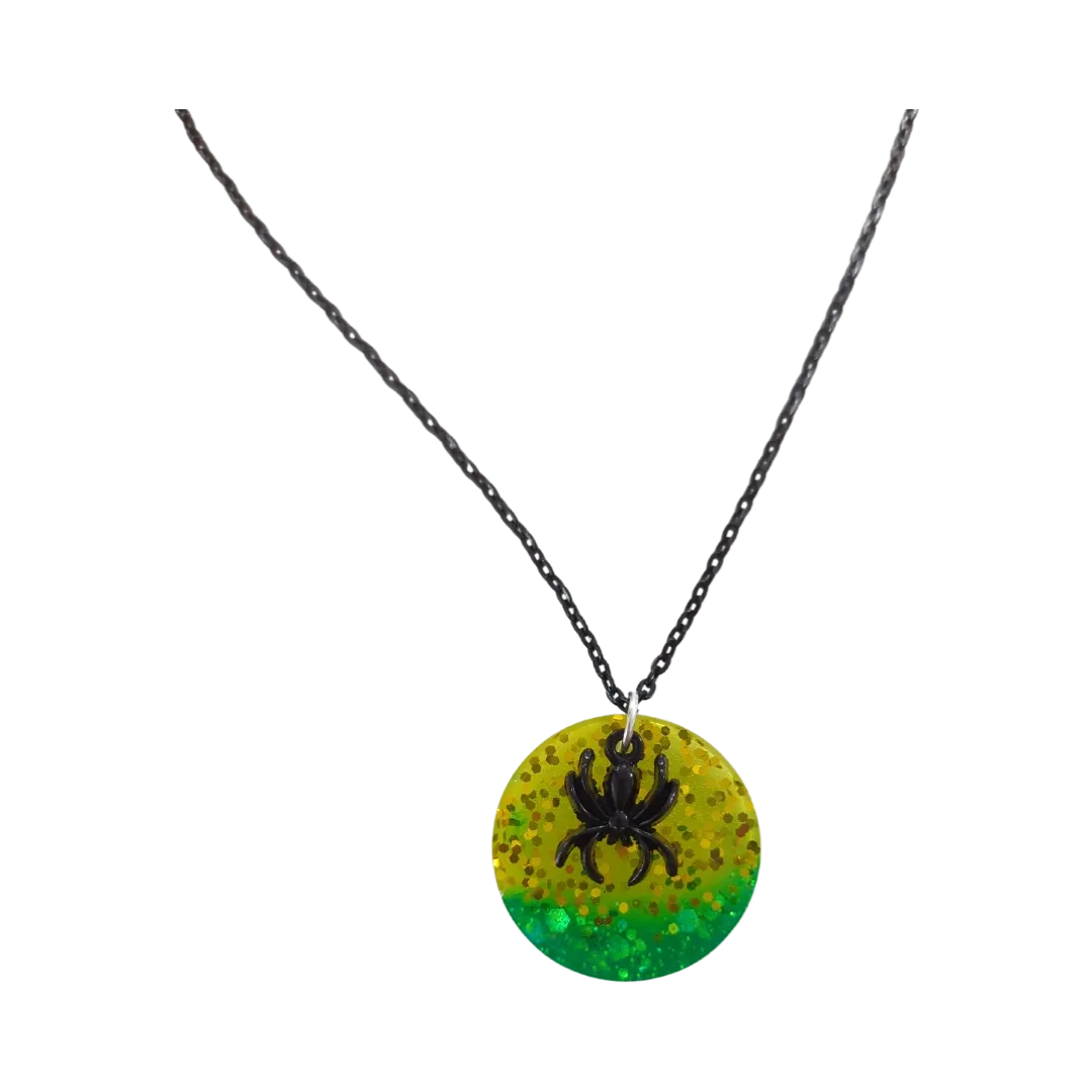 Necklace - 18 inches black chain with round yellow green resin circle ad black spider charm