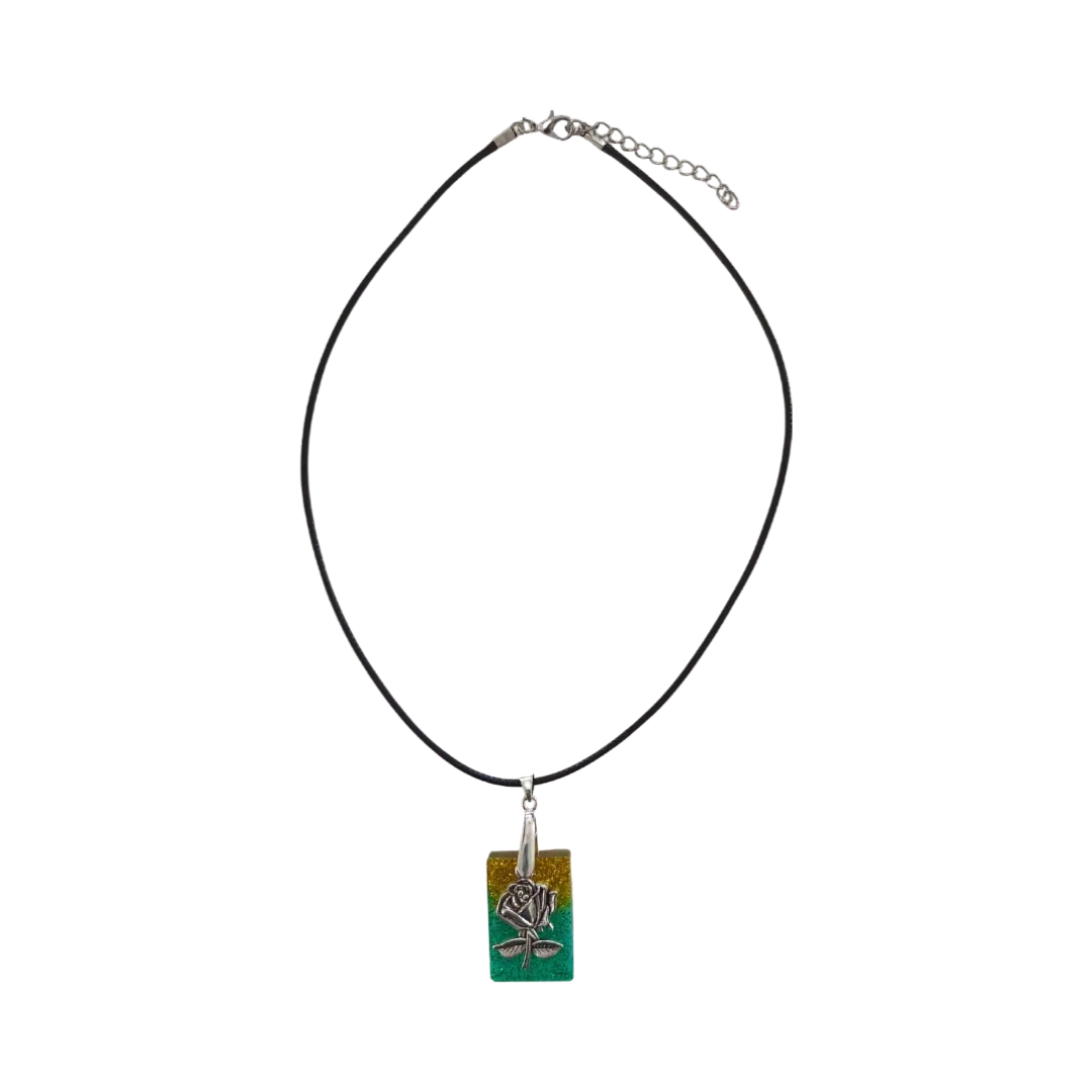 Necklace - 18 inches resin rectangle with silver flower charm on black cord