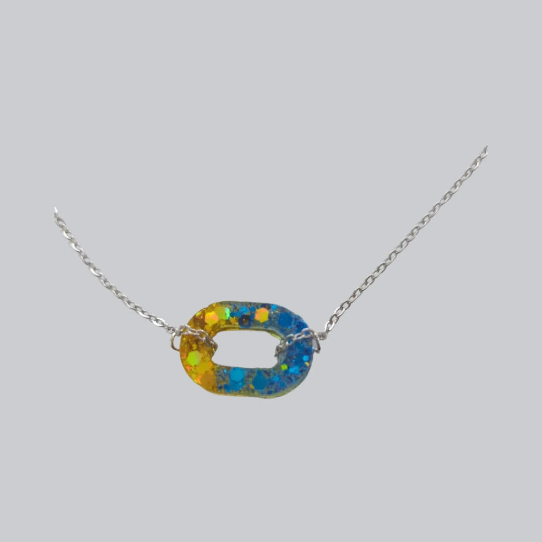 Necklace - 19 inches resin open oval on stainless steel chain