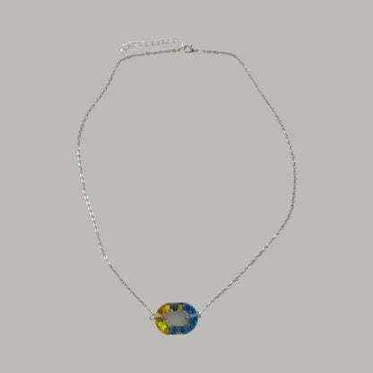 Necklace - 19 inches resin open oval on stainless steel chain