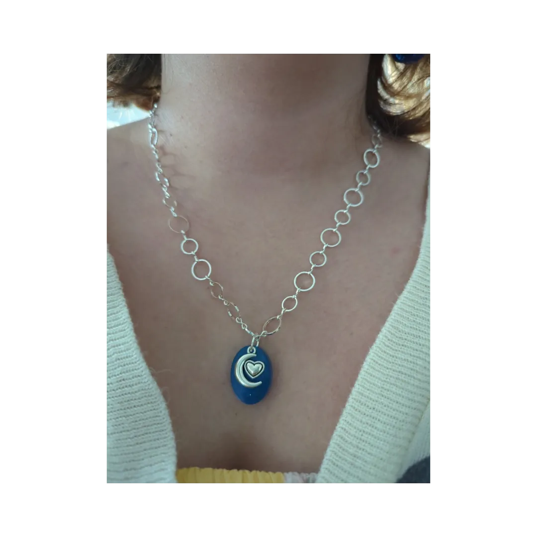 Necklace - 19 inches small blue glitter resin oval with silver moon heart charm brass chain